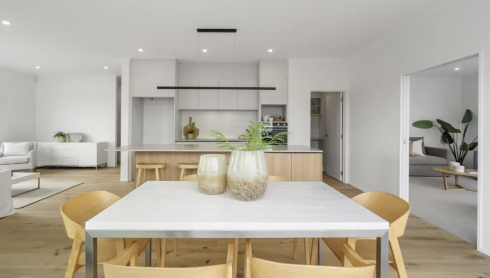 An interior view of the open plan living, kitchen and dining spaces.